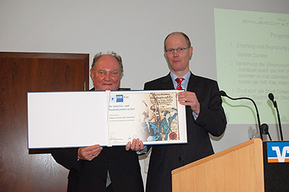 50th anniversary certificate of IHK Herr Koppmann IHK Kiel and Herr Günter Cordes